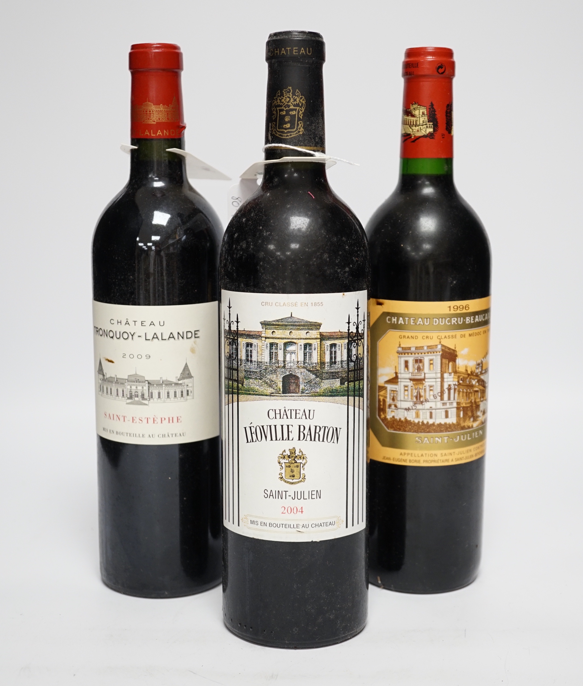 One bottle of Chateau Ducru-Beaucallou, Saint- Julienne grande cru classe Medoc 1996, one bottle of Chateau Leoville Barton Saint-Julienne 2004 and one bottle of Cateau Tronquoy-Lalande, Saint-Estelle 2009 (3)